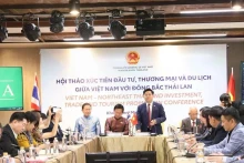 越南与泰国东北地区毛体投资与旅游促进会议场景。（图片来源：越通社）