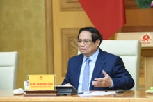 范明正总理在会上致辞。