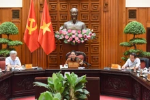 越南政府总理范明正主持召开会议。