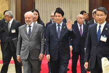 越南国家主席梁强与巴西总统卢拉·达席尔瓦出席招待晚宴。