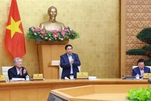 范明正总理主持召开会议。（图片来源：越通社）