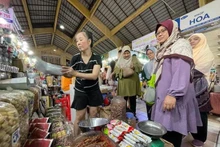 海外越南人积极引进和消费越南产品。（图片来源：越通社）