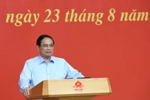 政府总理范明正主持召开越共第十四次全国代表大会经济社会小组第三次会议【组图】