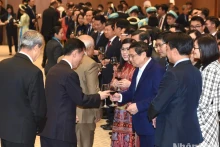 越南政府总理范明正和夫人主持各国驻越外交使团招待会。