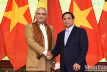 越南政府总理范明正与东帝汶总统若泽·拉莫斯·奥尔塔。（陈海 摄）