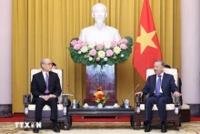苏林总书记、国家主席会见中国最高人民法院院长张军。