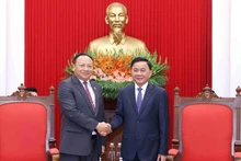 越共中央书记处常务书记陈锦秀会见老挝人民革命青年团中央书记蒙赛·劳姆松。