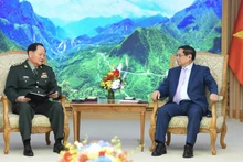 越南政府总理范明正会见中共中央军委副主席张又侠上将。