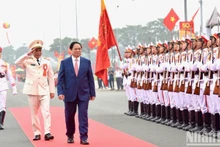 政府总理范明正出席越南机动警察力量成立50周年传统纪念日【组图】