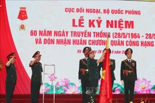 越南国防部对外局荣获一级军功勋章。