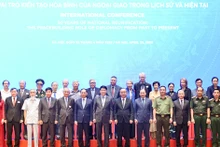 越南国家主席梁强出席题为“国家统一50周年：外交在历史与当代中的建设性作用”的国际研讨会【组图】
