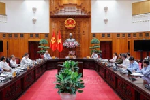 越南政府总理、越南区域与国际金融中心指导委员会主任范明正主持召开指导委员会会议。