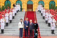 越共中央总书记阮富仲主持仪式 ，欢迎中共中央总书记、中国国家主席习近平访越。