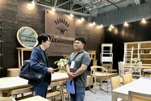 参加博览会的一个展位。（图片来源：越通社）