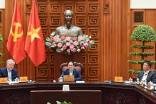 越南政府总理范明正主持召开关于美国对越南产品征收对等关税的会议【组图】