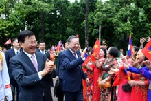 河内人民热烈欢迎通伦·西苏里总书记、国家主席对越南进行国事访问【组图】
