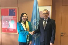 新任越南常驻联合国教科文组织代表团团长阮氏云英大使与教科文组织副总干事曲星。