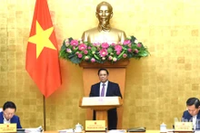 越南政府总理范明正主持2024年2月政府立法工作专题会议【组图】