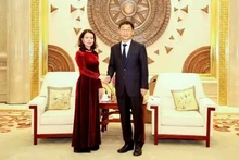 越南外交部副部长阮明姮会见了中共中央委员、广西壮族自治区党委书记、自治区人大常委会主任刘宁。