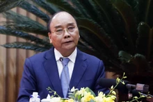 越南国家主席阮春福在会议上发表讲话。（图片来源：越通社）