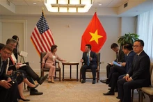 越南工贸部长阮鸿延会见美国商务部长雷蒙多。（图片来源：越通社）