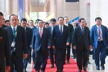 越南政府总理范明正与老挝总理、柬埔寨首相。（图片来源：越通社）