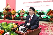 越南国家主席梁强在会上发表讲话。（图片来源：越通社）