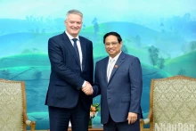 越南政府总理范明正会见经合组织织秘书长马蒂亚斯·科尔曼。