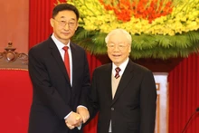 越共中央总书记阮富仲会见中国广西壮族自治区党委书记刘宁。（图片来源：越通社）