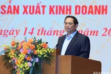 范明正总理发表讲话。