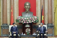 越南国家主席苏林会见中国全国政协主席王沪宁。（图片来源：越通社）