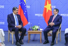 范明正总理会见委内瑞拉总统马杜罗。（图片来源：VGP）