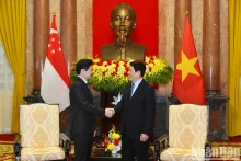越南国家主席梁强会见新加坡总理黄循财。