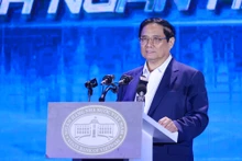 范明正总理发表讲话。（图片来源：VGP）