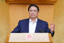 越南政府总理范明正发表讲话。（图片来源：VGP）