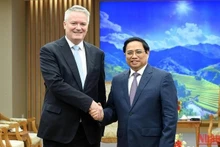 越南政府总理范明正会见经合组织秘书长马赛厄斯·科尔曼 。