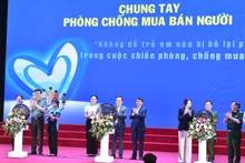 越南政府副总理陈流光出席携手预防和打击人口贩卖启动仪式。（图片来源：越通社）