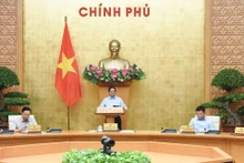 越南政府总理范明正主持召开政府立法专题会议【组图】