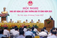范明正总理主持会议。（图片来源：VGP）