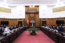 范明正总理主持会议。（图片来源：越通社）