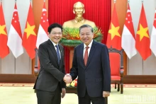 越共中央总书记苏林和新加坡总理黄循财。