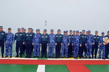 双方代表合影。