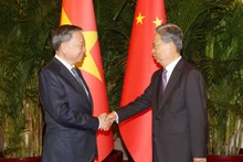 越共中央总书记、国家主席苏林和中国全国人大常委会委员长赵乐际。（图片来源：越通社）