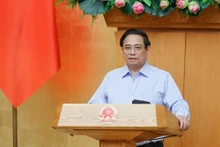 越南政府总理范明正发表讲话。（图片来源：VGP）