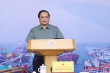 越南政府总理范明正发表讲话。（图片来源：VGP）