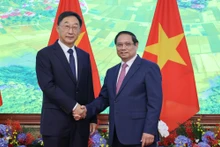 越南政府总理范明正会见广西人民代表会议常务委员会委员长刘宁。（图片来源：越通社）