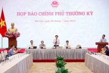 越南政府办公厅在河内召开2024年6月政府例行记者会。（图片来源：VGP）