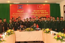 双方签署军事合作备忘录。（图片来源：得乐报网）