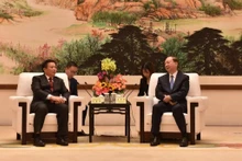 阮春胜同志会见中共中央政治局委员、广东省委书记黄坤明。（图片来源：越通社）