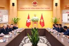工作会谈场景。（图片来源：越通社）
